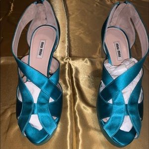 Teal miu miu 5 inches peep toe heel.